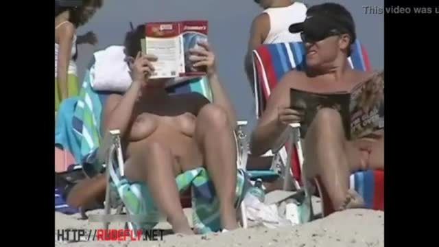 Couple split by Strangers on a nude beach