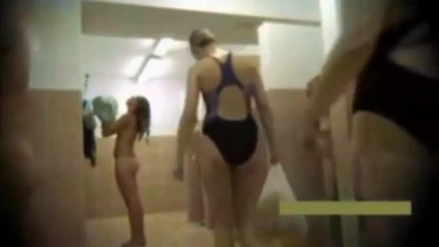 Teens and moms in public shower room