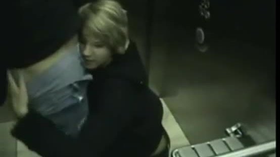 Couple in elevator